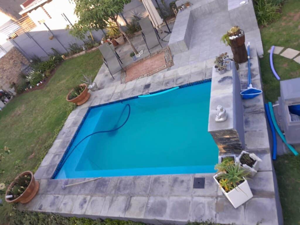 Installed Cosmo pool in a garden setting